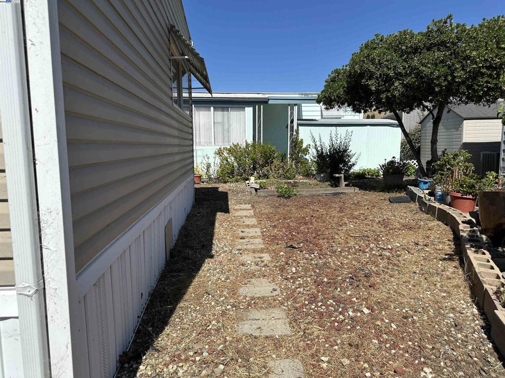 711 Old Canyon Road Fremont, CA 94538 - Photo 33 of 39 a view of a backyard with potted plants