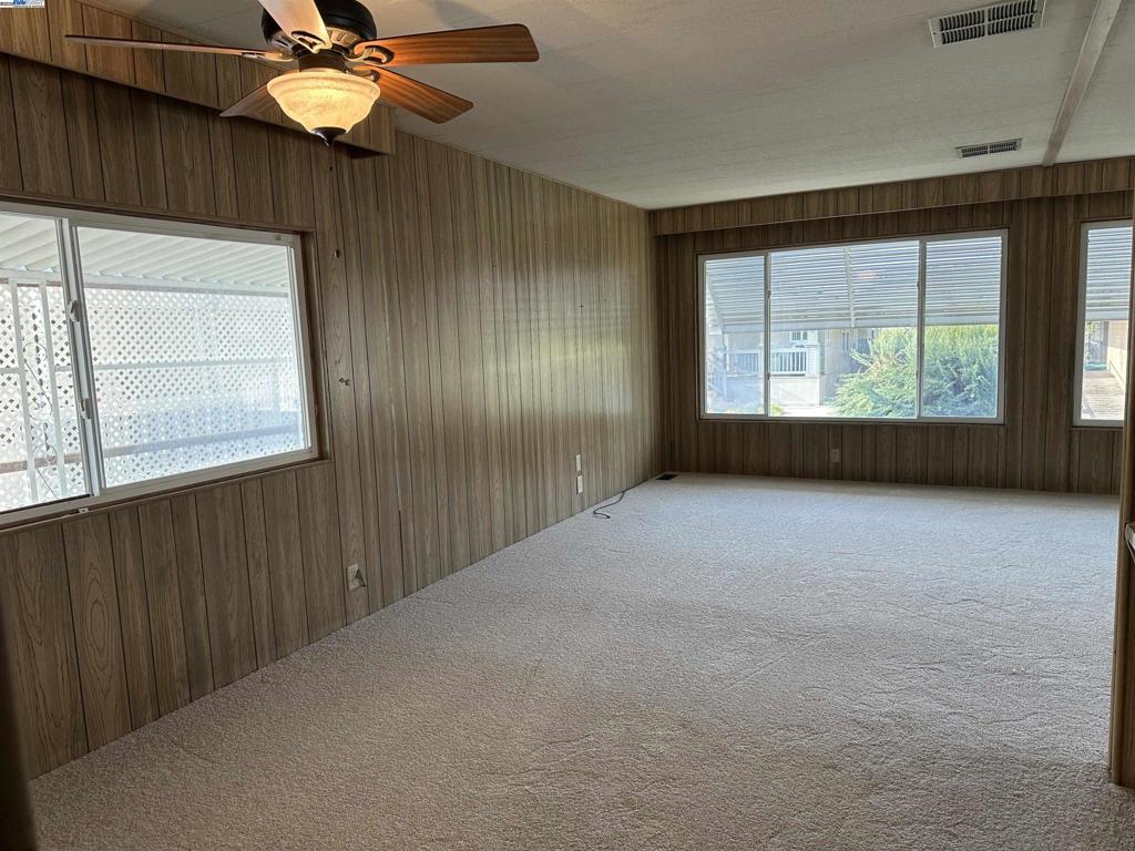 711 Old Canyon Road Fremont, CA 94538 - Photo 10 of 39 a view of an empty room with a window