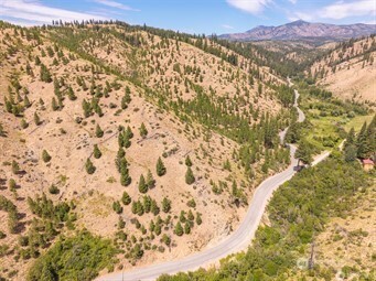 3 Mud Creek Road Entiat, WA 98822 - Photo 8 of 28 a view of a sky from a building
