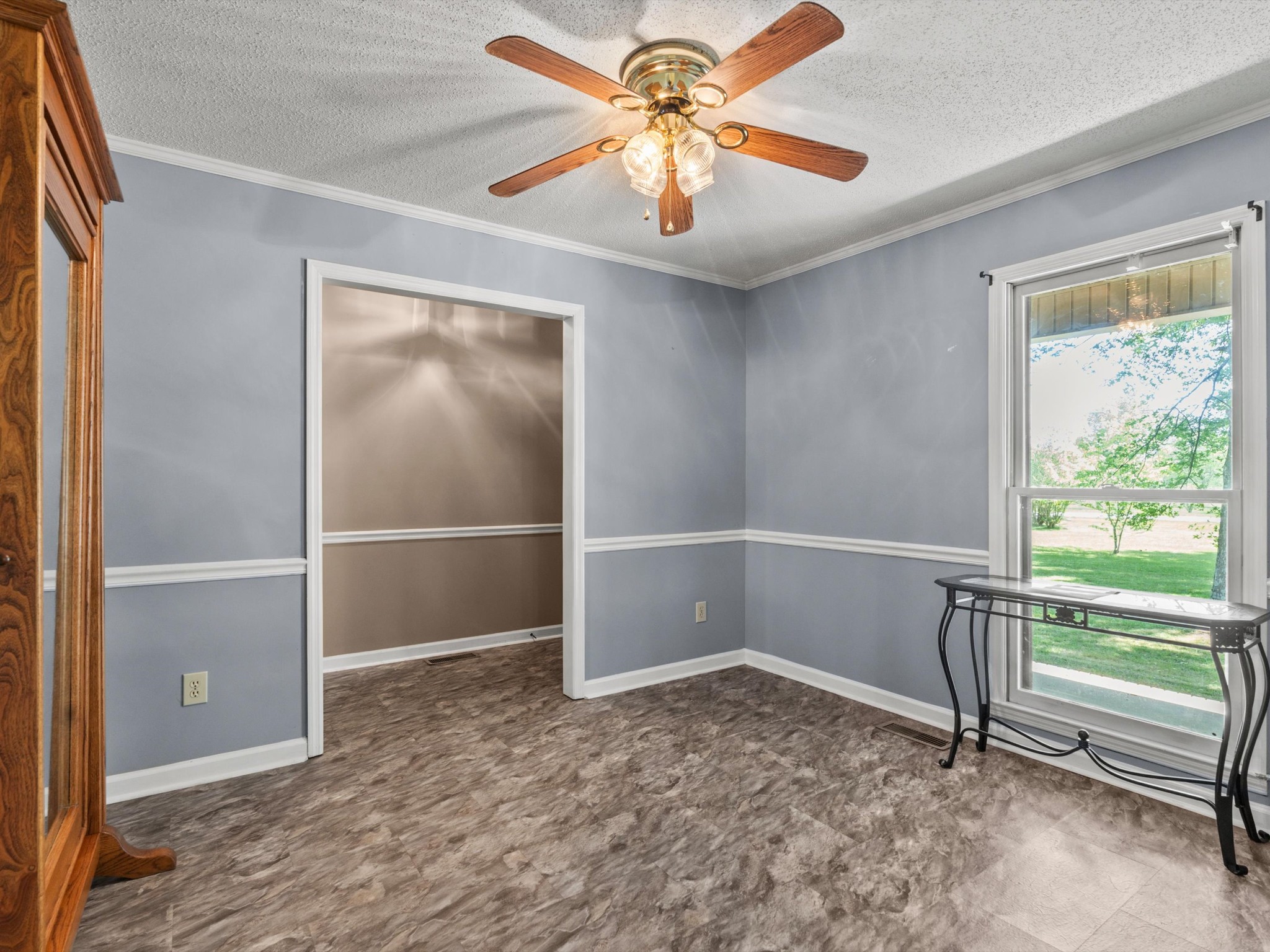 6934 Old Railroad Bed Road Toney, AL 35773 - Photo 11 of 38 wooden floor in an empty room with a window