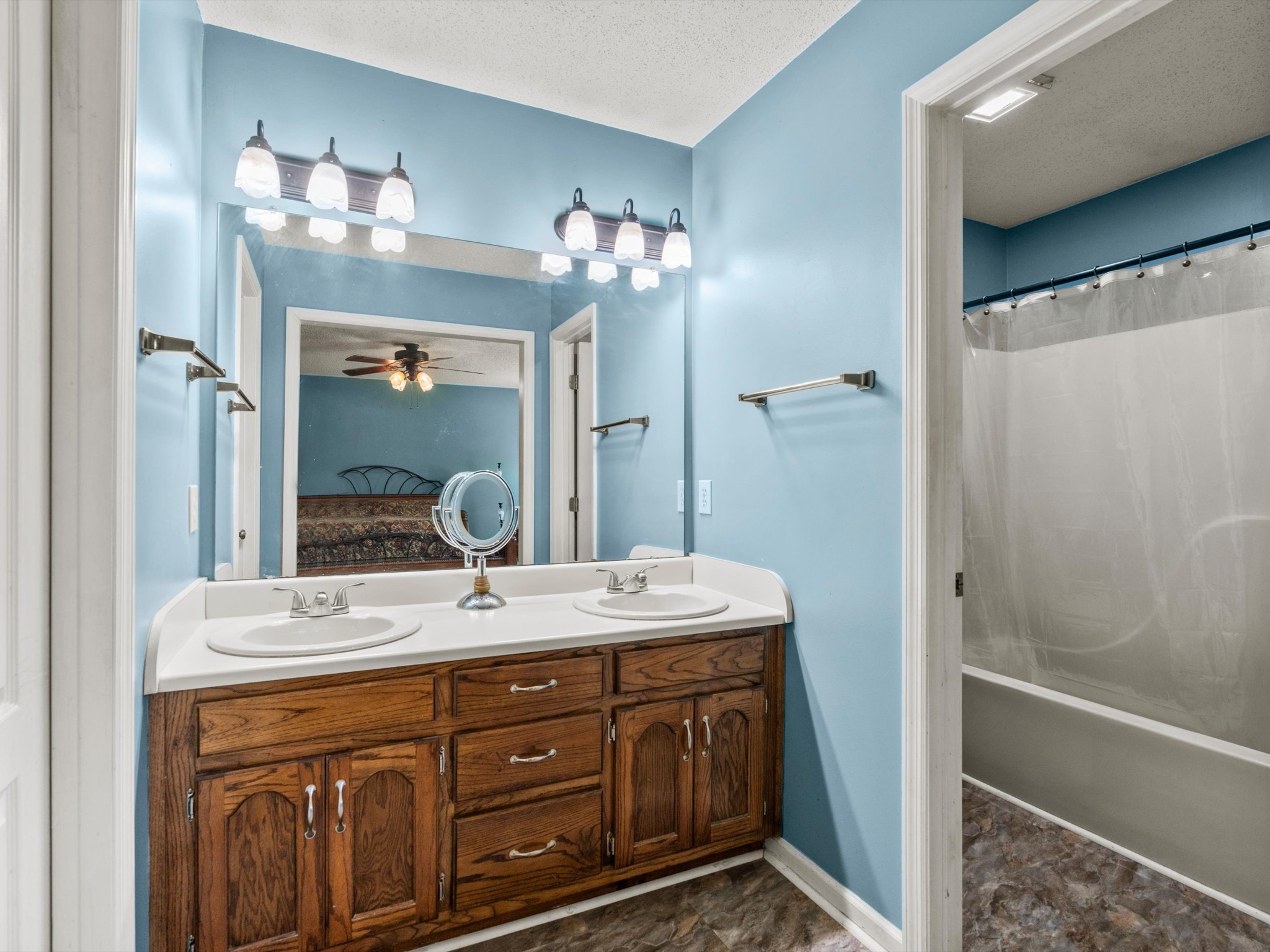 6934 Old Railroad Bed Road Toney, AL 35773 - Photo 17 of 38 a bathroom with a sink double vanity and a mirror