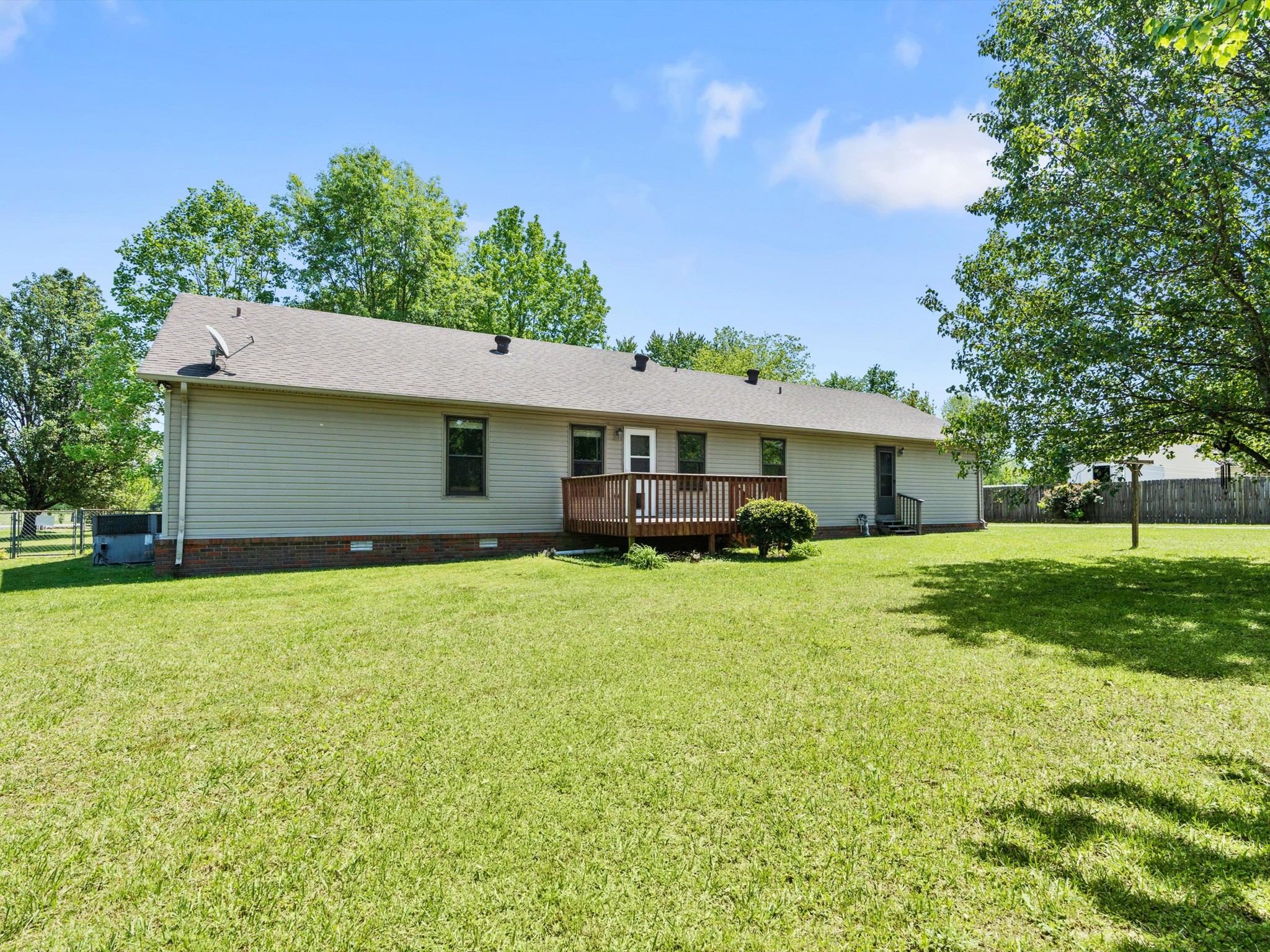 6934 Old Railroad Bed Road Toney, AL 35773 - Photo 36 of 38 a front view of a house with a garden