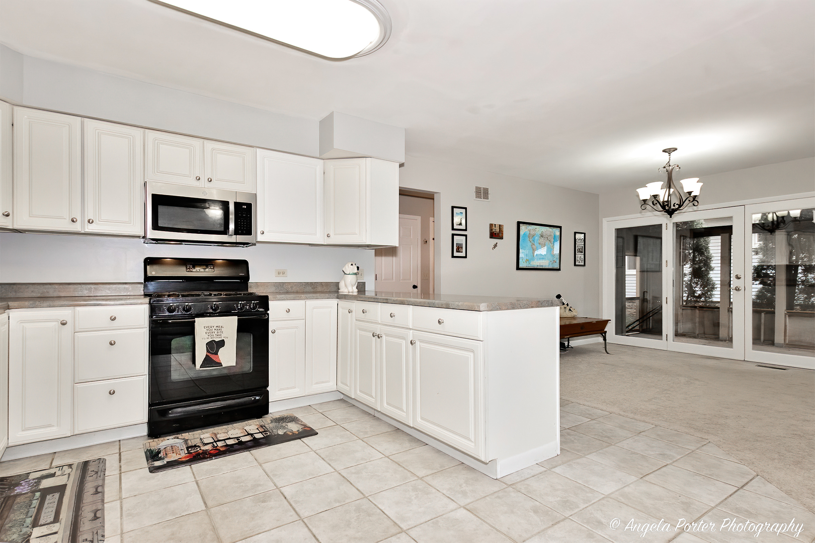 238 Harding Street Grayslake, IL 60030 - Photo 11 of 21 a kitchen with cabinets and window