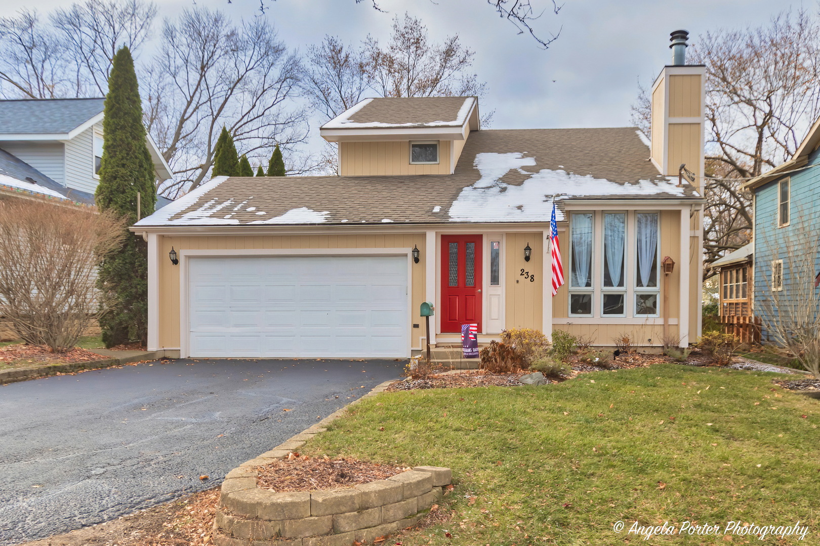 238 Harding Street Grayslake, IL 60030 - Photo 21 of 21 a front view of a house with a yard
