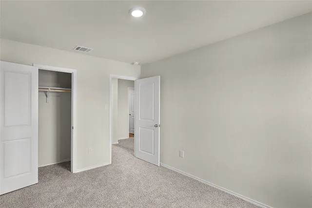 a view of a balcony with an outdoor space