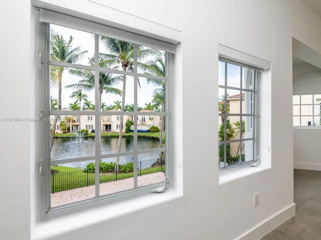 a view of staircase with white walls