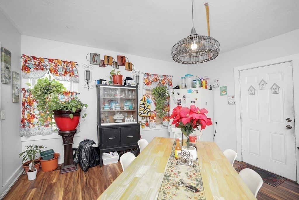 129 Branch Street Fall River, MA 02721 - Photo 5 of 13 a view of a dining room with furniture and wooden floor