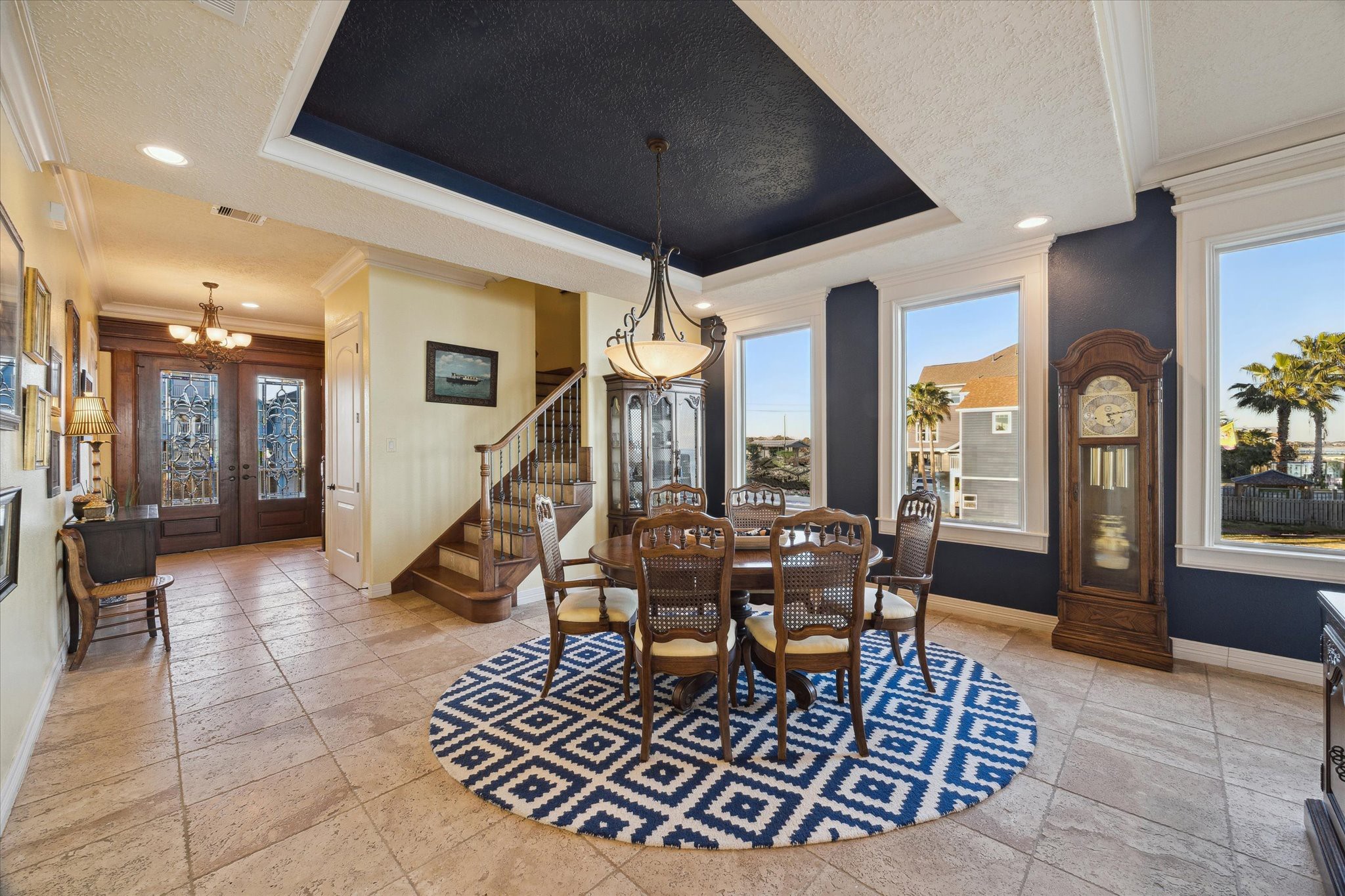 1406 Todville Road Seabrook, TX 77586 - Photo 13 of 50 BEAUTIFUL CHISELED EDGE TRAVERTINE TILE FLOORS FLOW THROUGHOUT THE LIVING AREA INCLUDING THE DINING ROOM.