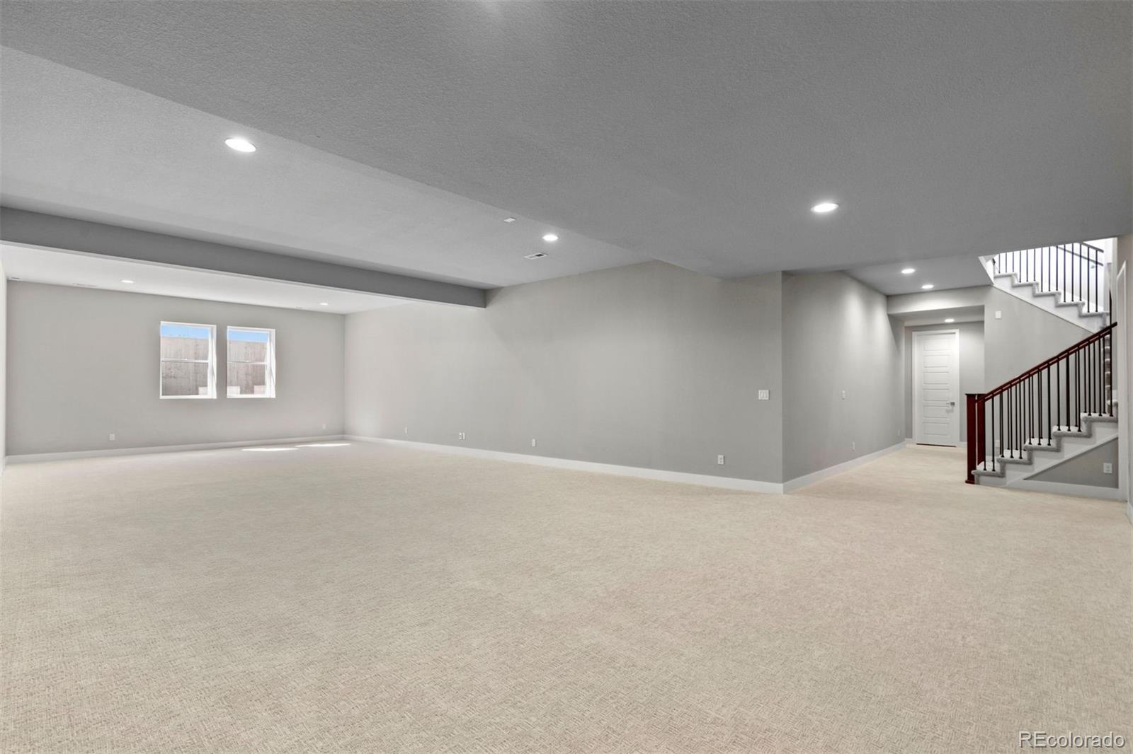 2230 Rim Ridge Drive Castle Pines, CO 80108 - Photo 32 of 33 a view of an empty room with a window