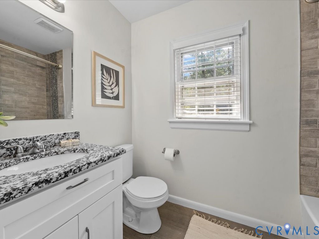 1803 Marroit Road Henrico, VA 23229 - Photo 22 of 34 Hall bath w/ granite counters, tiled tub/shower co