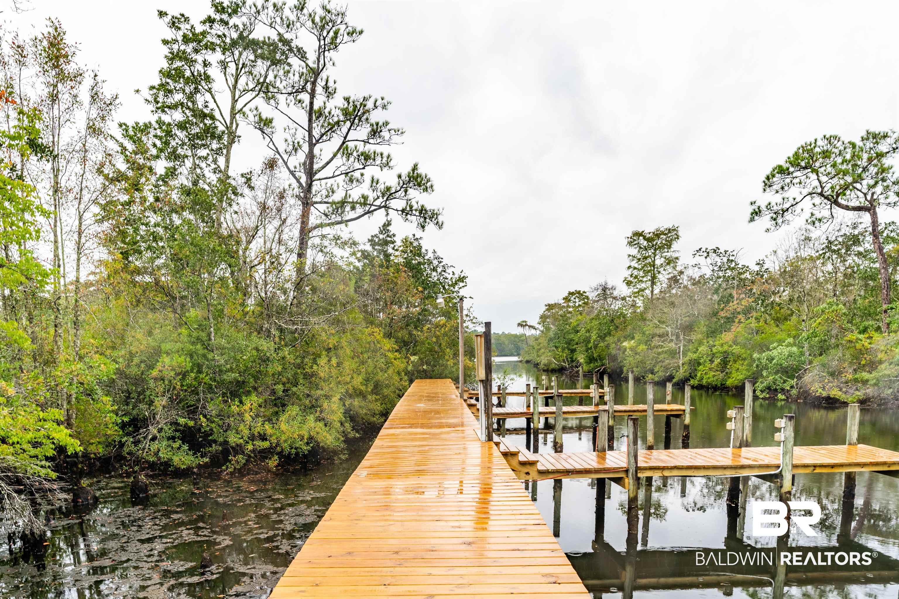 4055 Riviere Du Chien Road Mobile, AL 36693 - Photo 57 of 63 Dock area featuring a water view