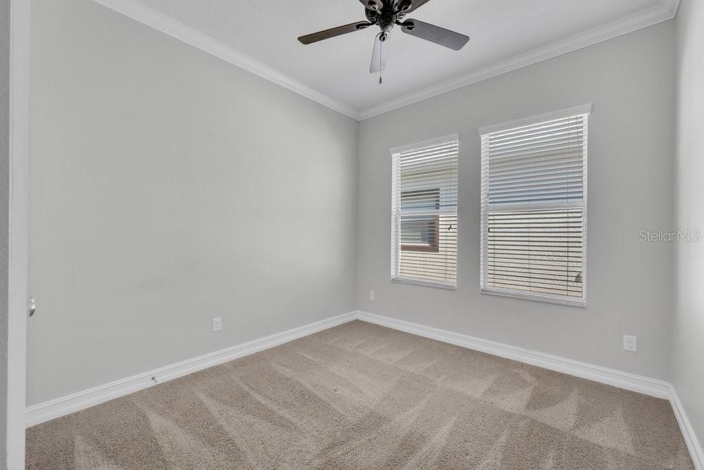 15607 Sunset Run Lane Lithia, FL 33547 - Photo 21 of 54 a view of an empty room with a window