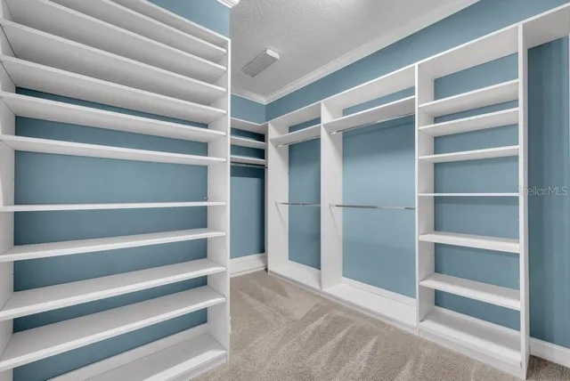 a bathroom with a bathtub a sink and a window