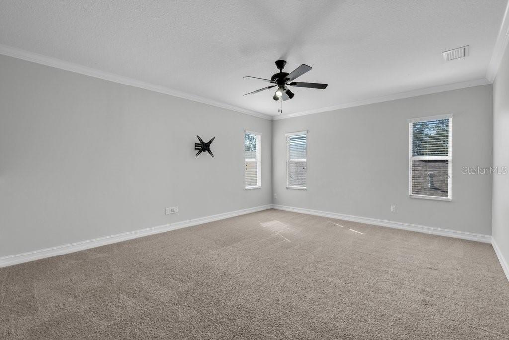 15607 Sunset Run Lane Lithia, FL 33547 - Photo 29 of 54 a view of an empty room with a window