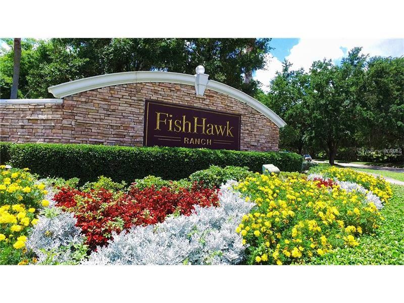 15607 Sunset Run Lane Lithia, FL 33547 - Photo 41 of 54 a black and white photo of a book