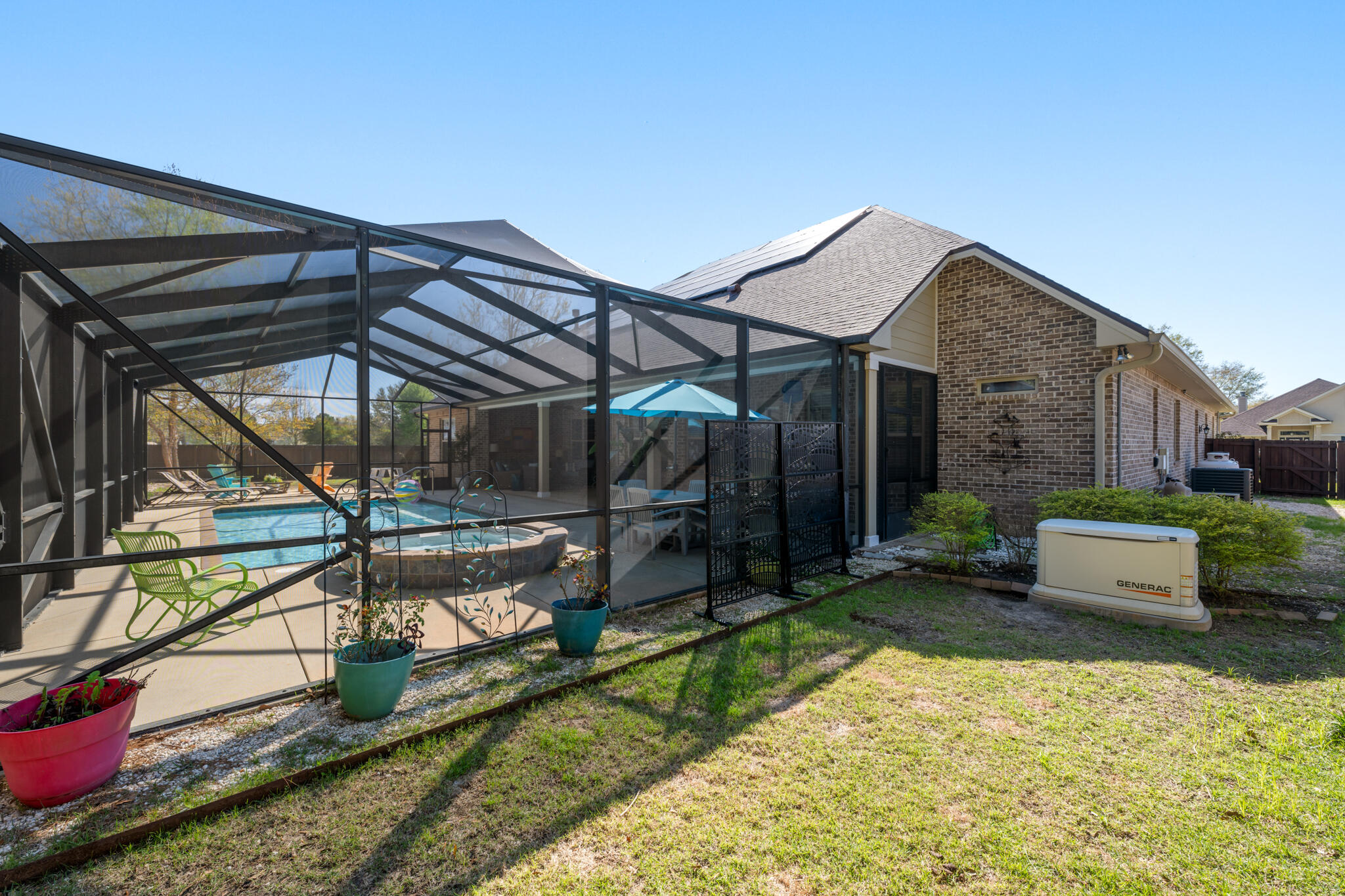 5556 Madelines Way Pace, FL 32571 - Photo 54 of 65 side view of pool