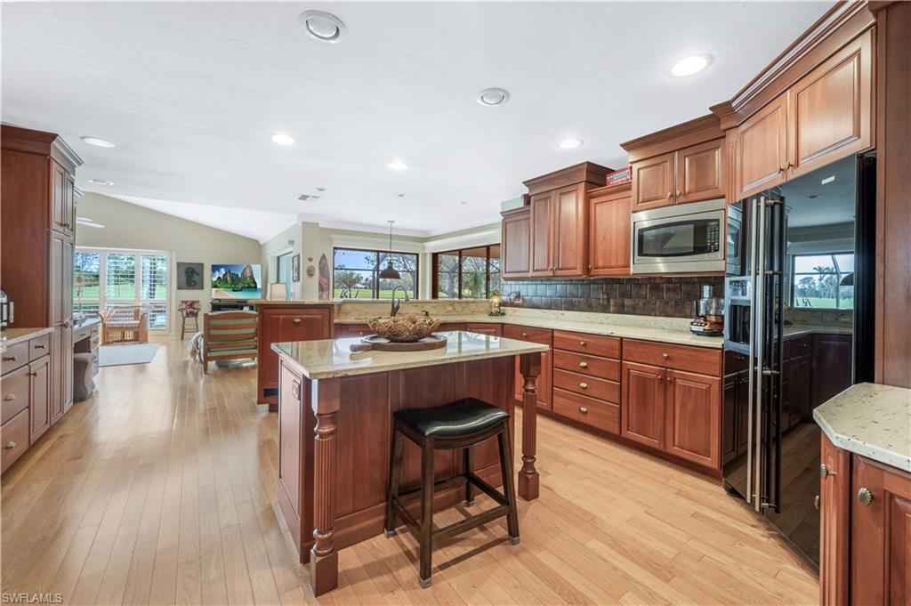 2256 Imperial Golf Course Boulevard Naples, FL 34110 - Photo 17 of 49 Elevated dishwasher & plenty of quality cabinetry.