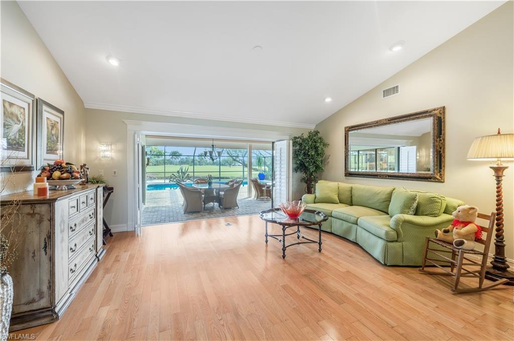 2256 Imperial Golf Course Boulevard Naples, FL 34110 - Photo 22 of 49 Disappearing sliding doors to the covered lanai.