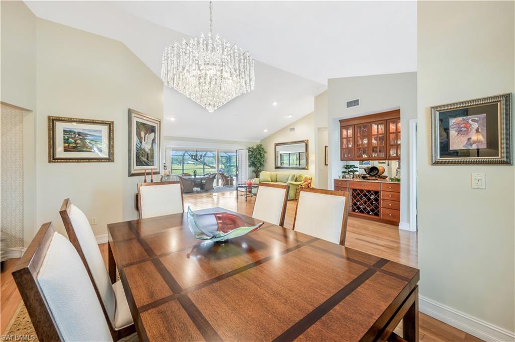 2256 Imperial Golf Course Boulevard Naples, FL 34110 - Photo 25 of 49 Golf course views from the dining room even..