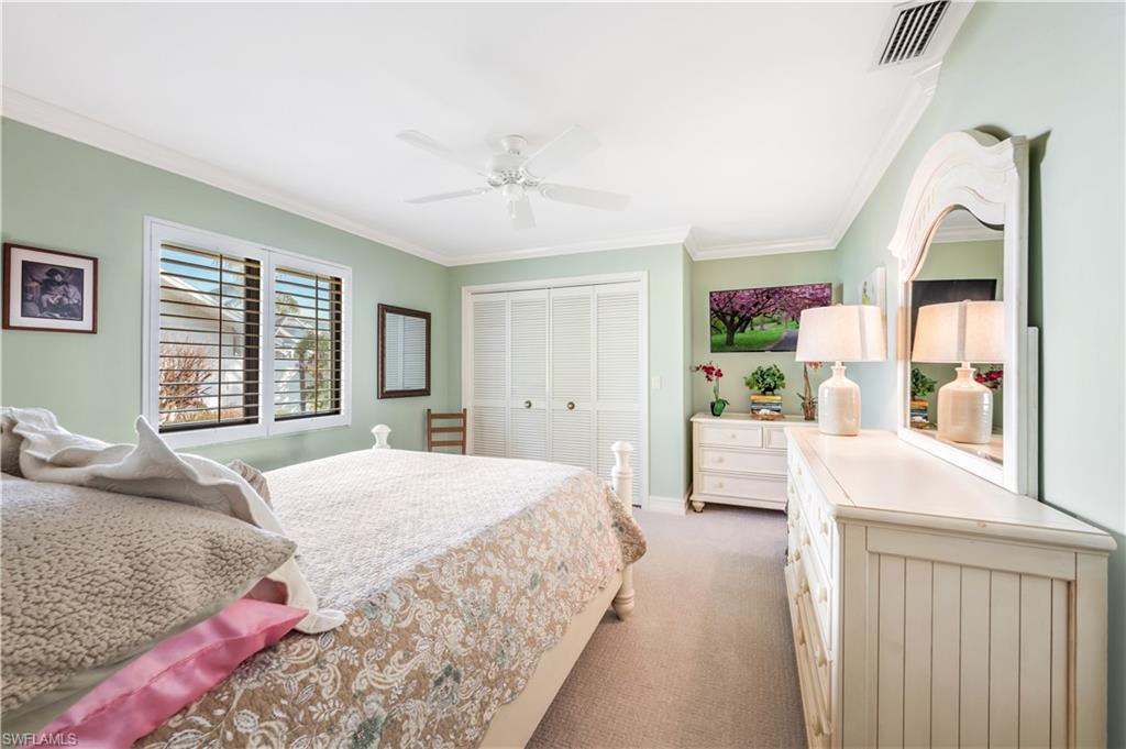 2256 Imperial Golf Course Boulevard Naples, FL 34110 - Photo 43 of 49 Crown & Plantation shutters in both guest rooms