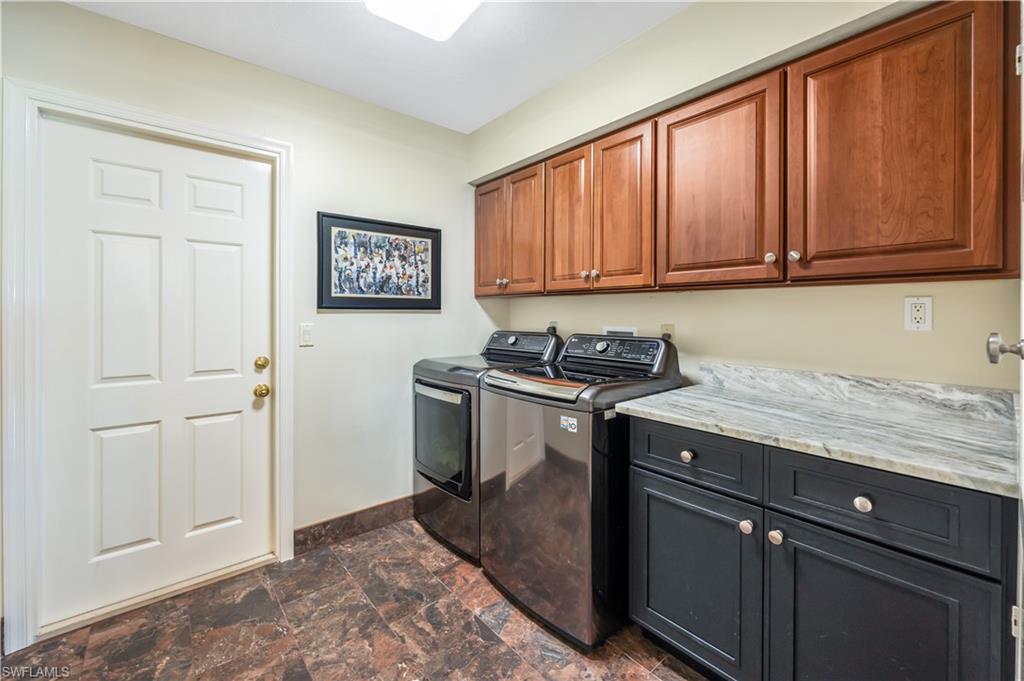 2256 Imperial Golf Course Boulevard Naples, FL 34110 - Photo 47 of 49 Oversize laundry with lots of extra cabinets.