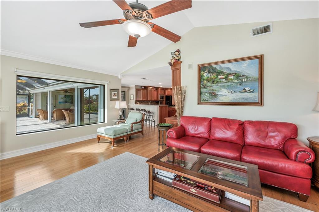 2256 Imperial Golf Course Boulevard Naples, FL 34110 - Photo 9 of 49 LOOK at this ceiling height & rich wood flooring...