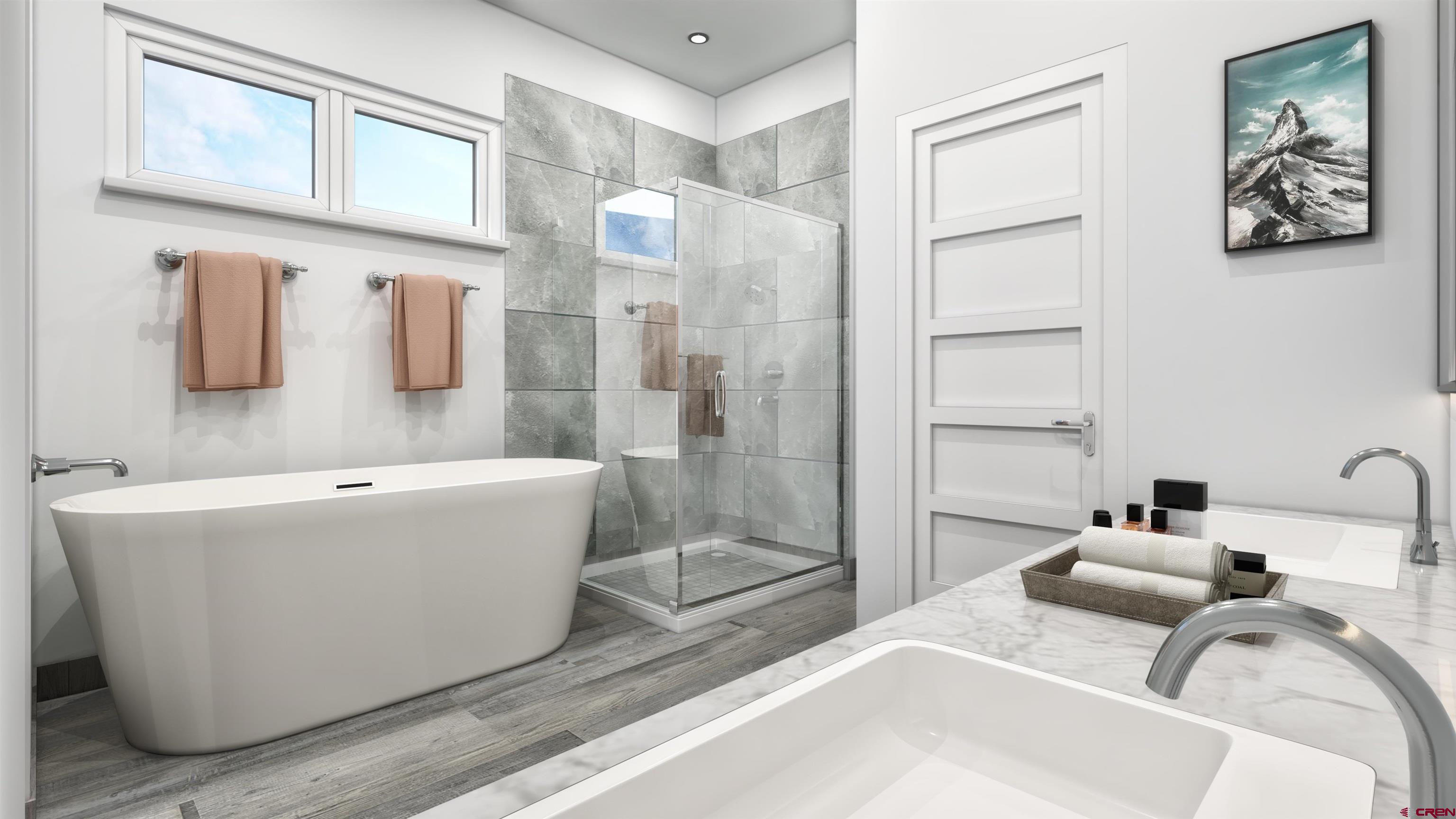 115 Travertine Trail, Unit PHASE III 4 Durango, CO 81301 - Photo 4 of 34 a bathroom with a bathtub and shower