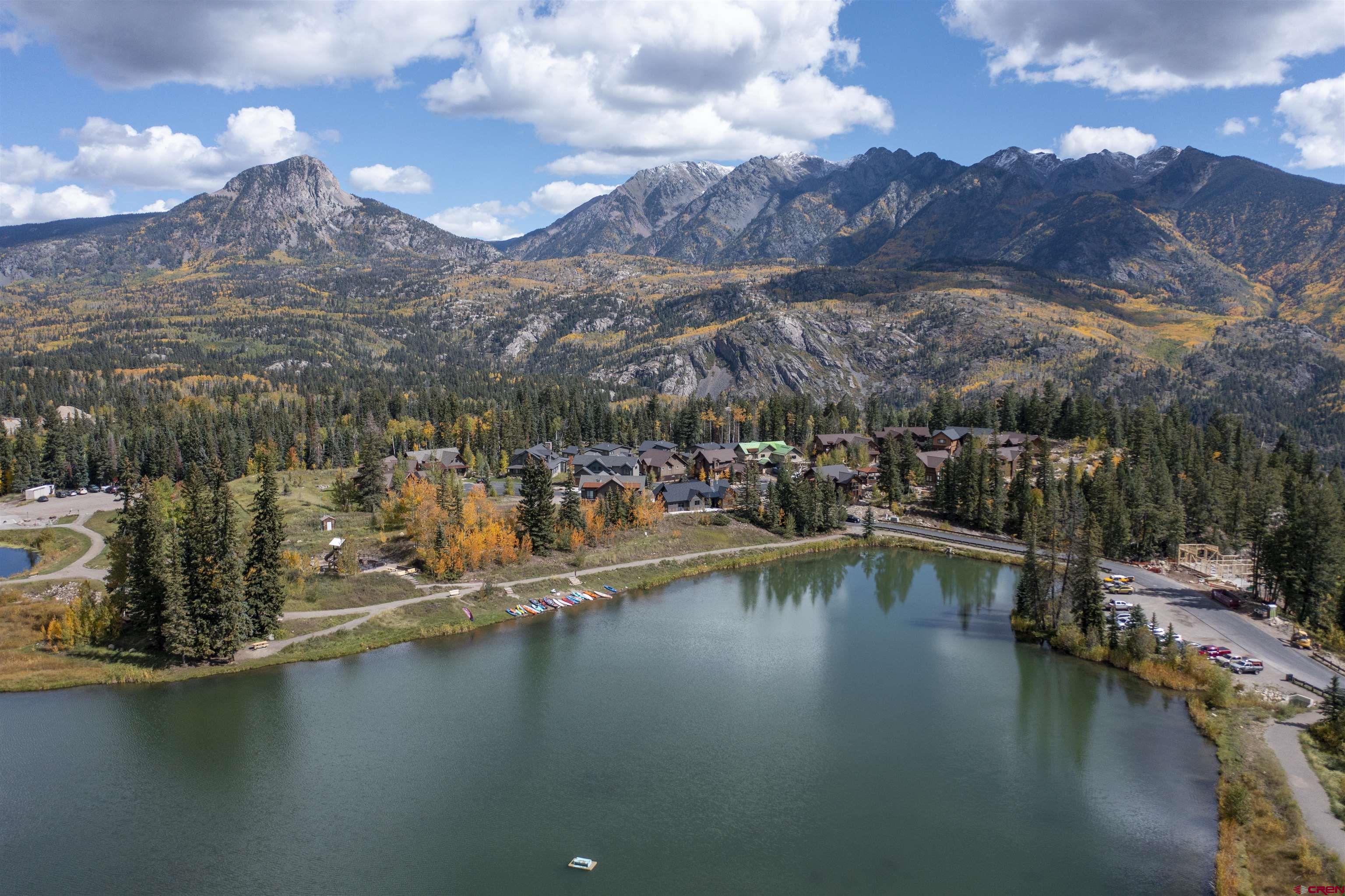 115 Travertine Trail, Unit PHASE III 4 Durango, CO 81301 - Photo 5 of 34 a view of a lake with boats and trees