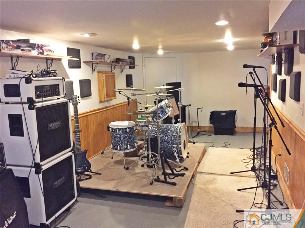 9 Sine Road Edison, NJ 08817 - Photo 15 of 21 a view of a room with gym equipment