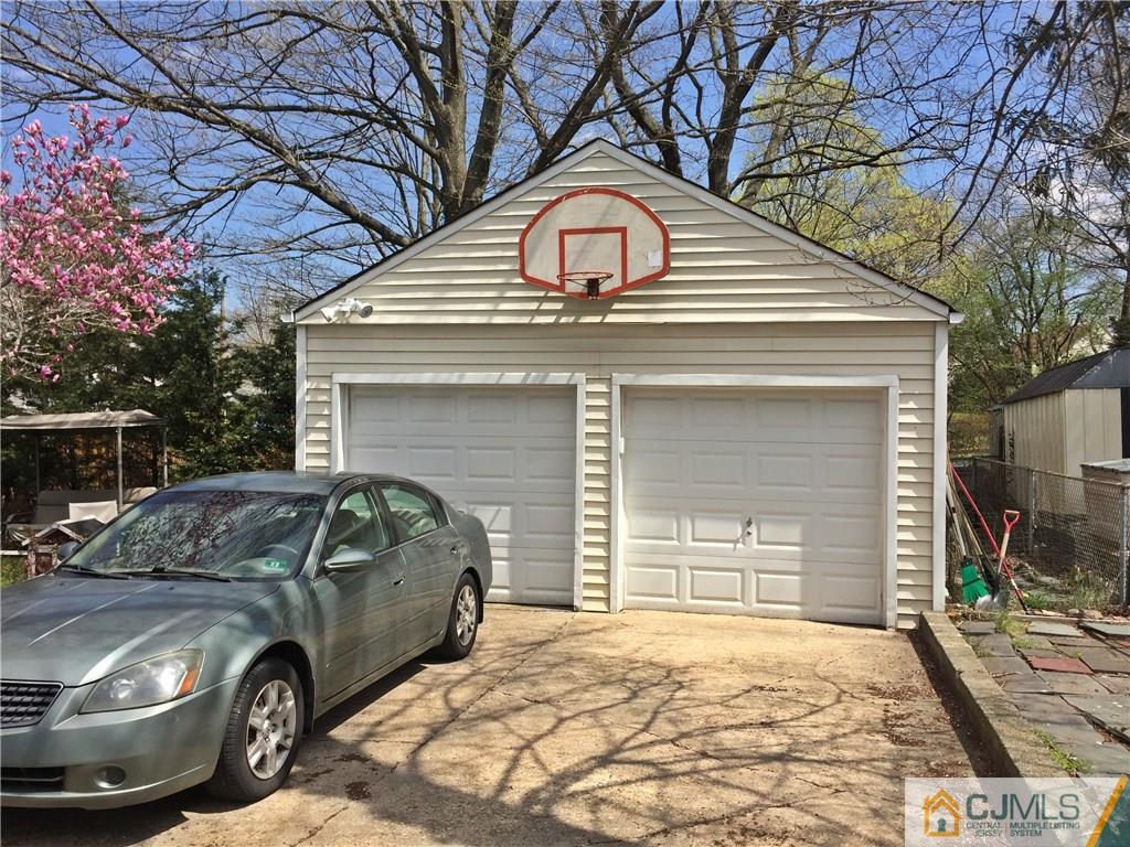 9 Sine Road Edison, NJ 08817 - Photo 21 of 21 a car parked in front of a house