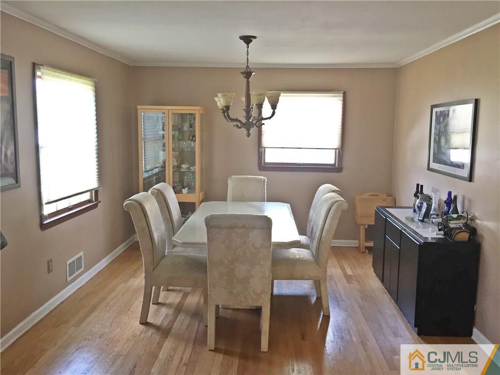 9 Sine Road Edison, NJ 08817 - Photo 6 of 21 a dining room with furniture and window