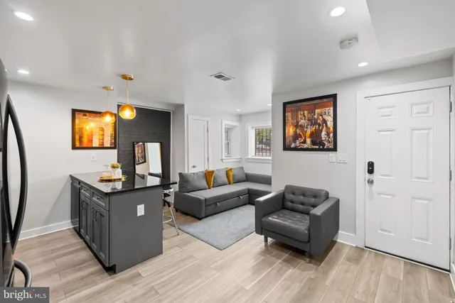 a view of entryway with wooden floor