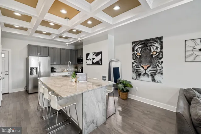 a open kitchen with a table and chairs