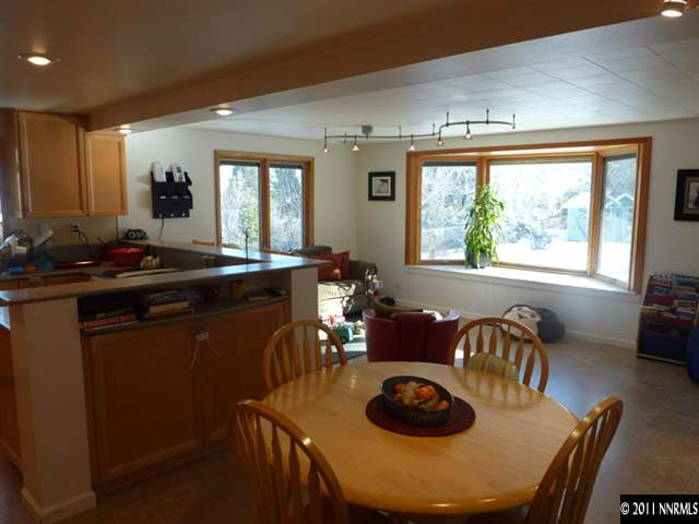 2340 Armstrong Lane Reno, NV 89509 - Photo 4 of 7 a kitchen with a table and chairs in it
