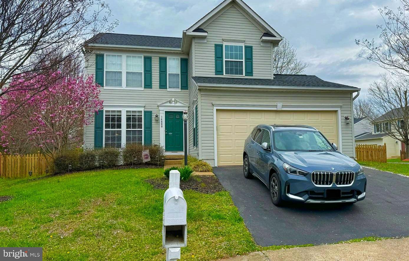a car parked in front of a house