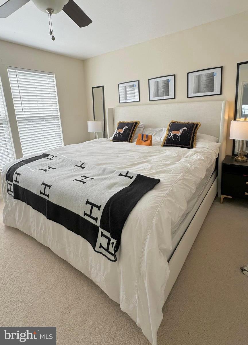 14660 Red House Road Gainesville, VA 20155 - Photo 12 of 20 a bedroom with a bed and a large window