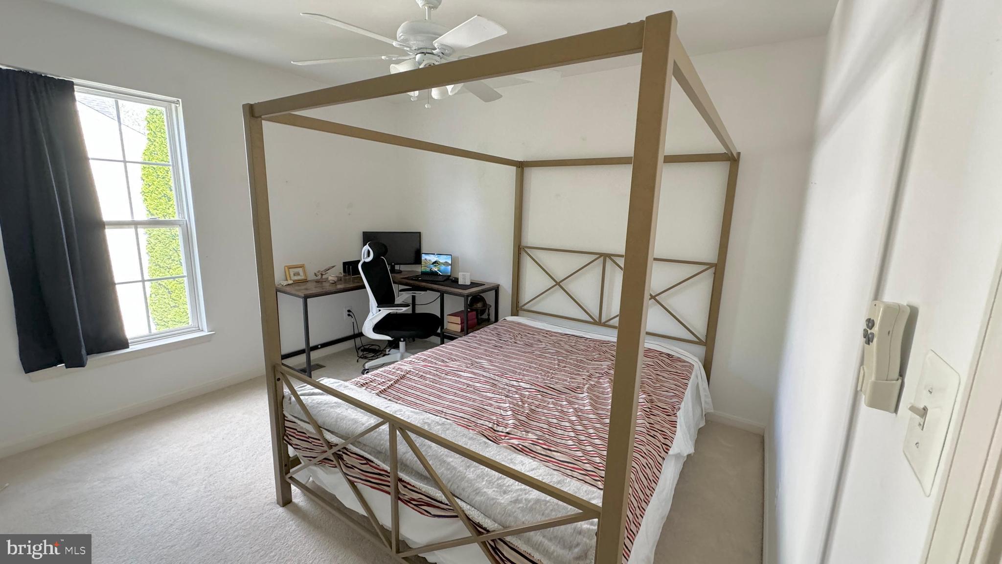 14660 Red House Road Gainesville, VA 20155 - Photo 14 of 20 a room that has a bed and a window in it