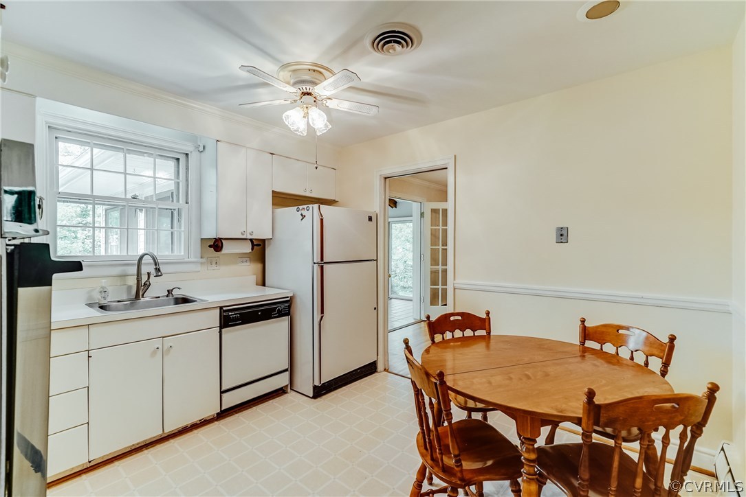 9315 Newhall Road Henrico, VA 23229 - Photo 8 of 18 Kitchen is eat-in and is off of dining room and de