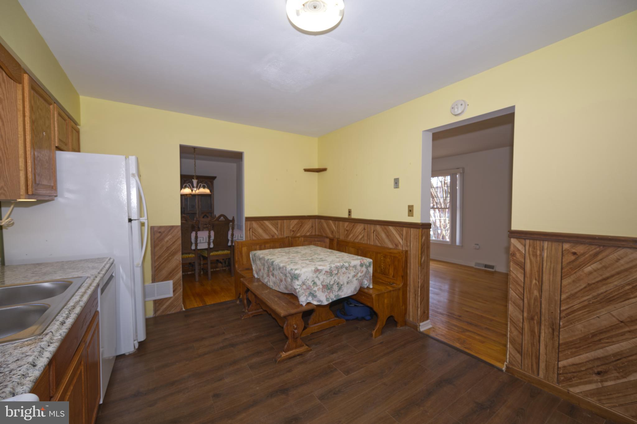 843 Townsend Boulevard Dover, DE 19901 - Photo 15 of 35 a living room with furniture and a wooden floor
