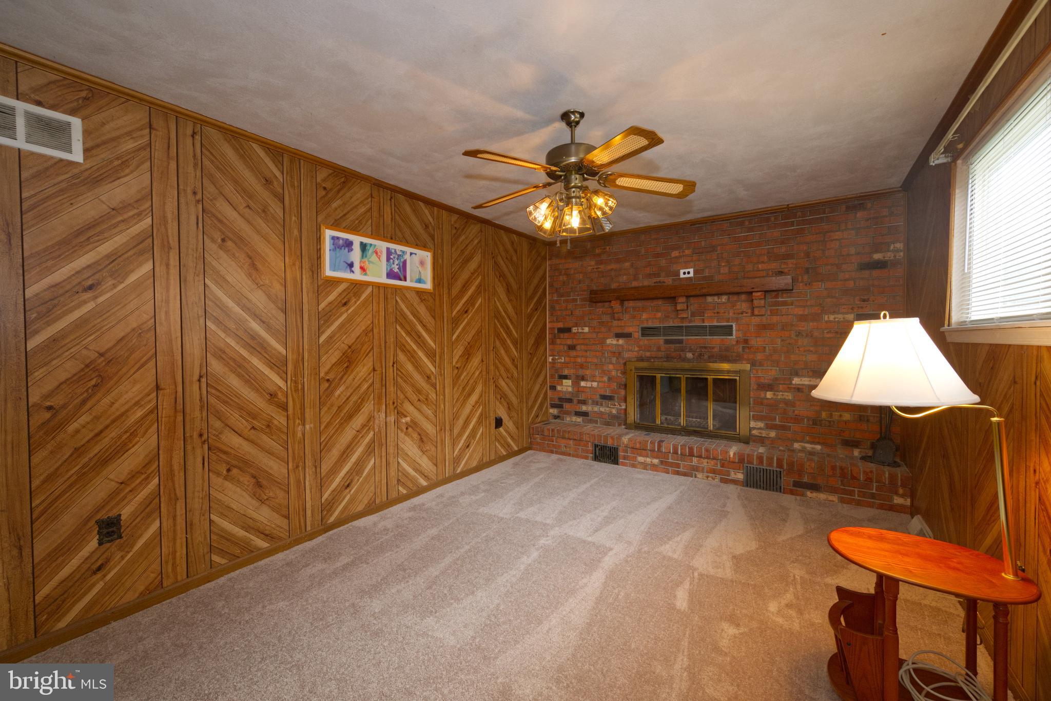 843 Townsend Boulevard Dover, DE 19901 - Photo 21 of 35 a view of a livingroom with furniture and chandelier fan
