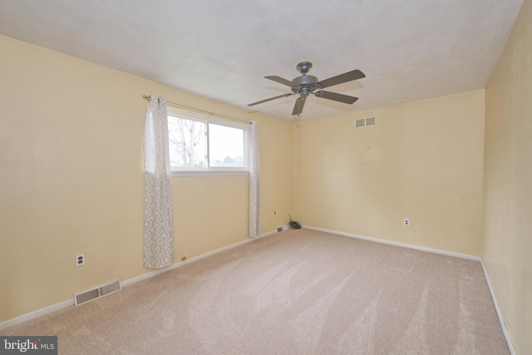 843 Townsend Boulevard Dover, DE 19901 - Photo 26 of 35 a view of room with window and ceiling fan