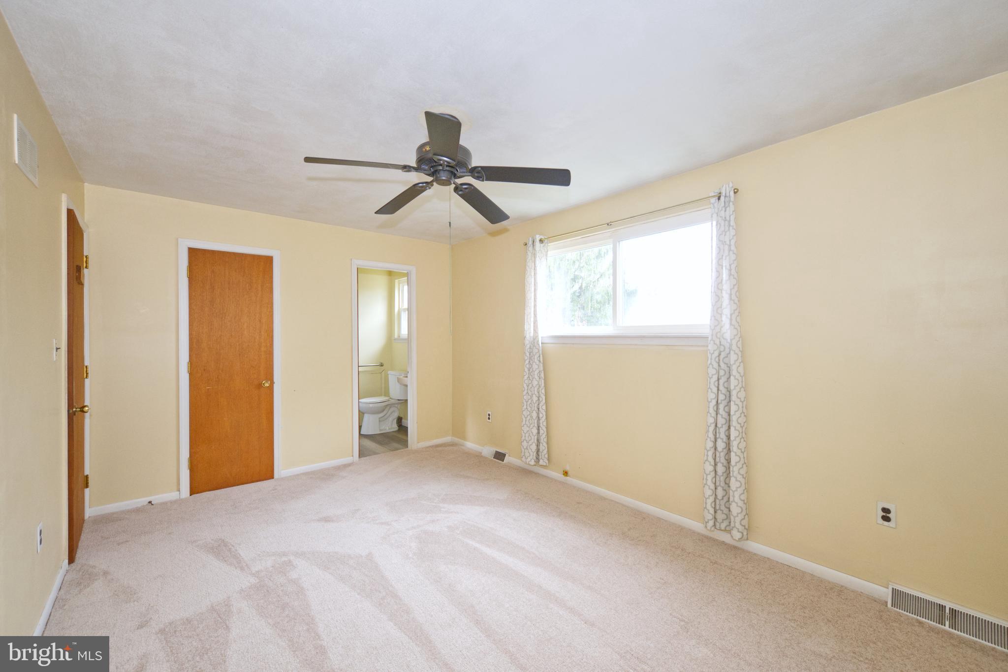 843 Townsend Boulevard Dover, DE 19901 - Photo 27 of 35 a view of empty room with window and ceiling fan