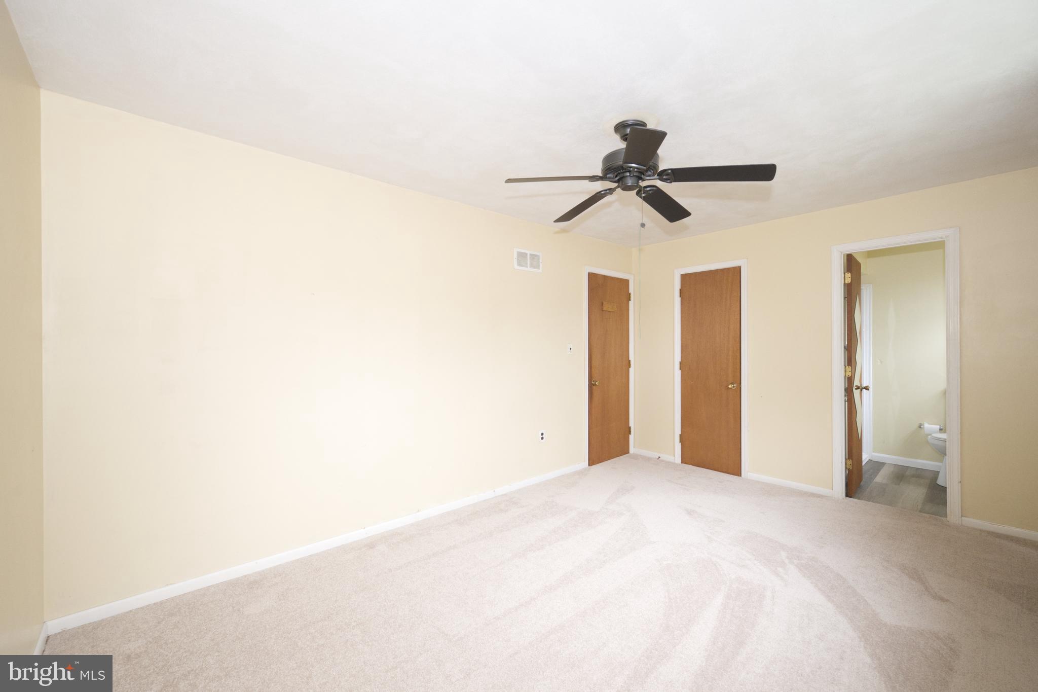 843 Townsend Boulevard Dover, DE 19901 - Photo 28 of 35 a view of a room with a ceiling fan and a window