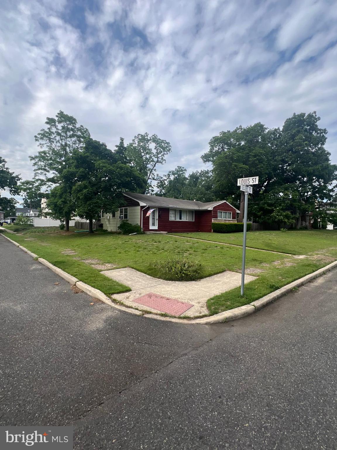 39 Lejune Road Cinnaminson, NJ 08077 - Photo 3 of 11 a view of a house with a big yard and a large tree