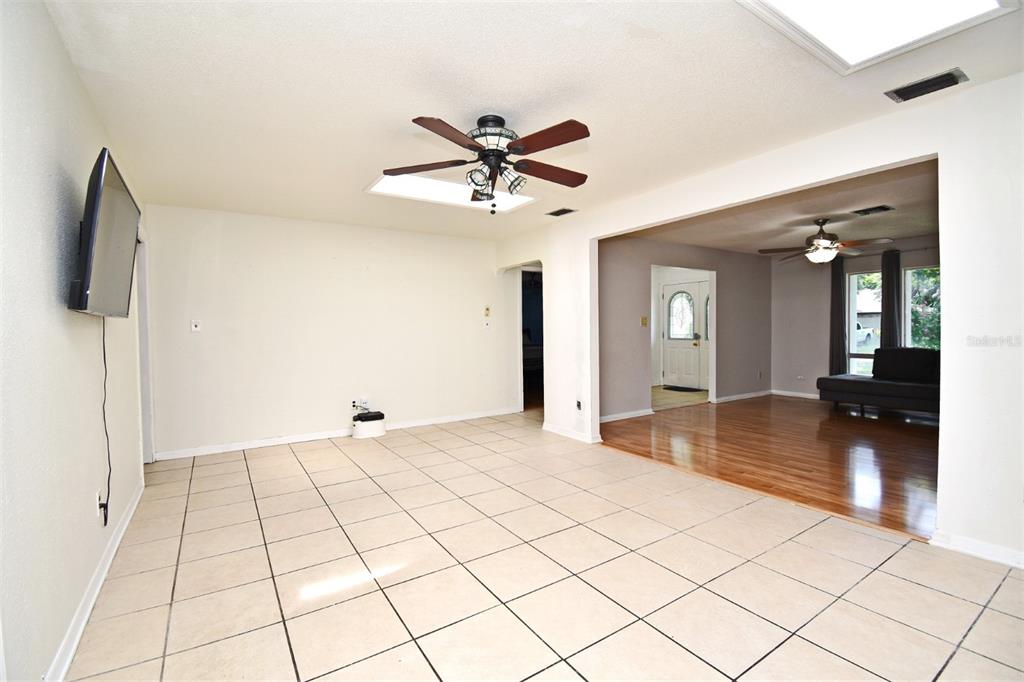 5133 Brenda Drive Orlando, FL 32812 - Photo 19 of 51 a view of a livingroom with a furniture and a ceiling fan
