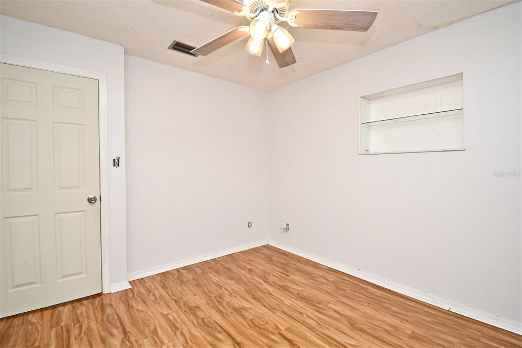 5133 Brenda Drive Orlando, FL 32812 - Photo 30 of 51 wooden floor in an empty room