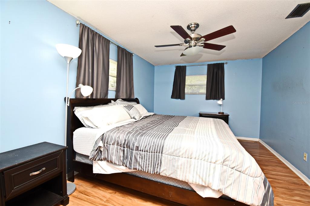 5133 Brenda Drive Orlando, FL 32812 - Photo 40 of 51 a bedroom with a bed and window