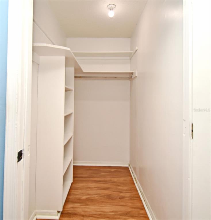 5133 Brenda Drive Orlando, FL 32812 - Photo 42 of 51 a view of a hallway with wooden floor