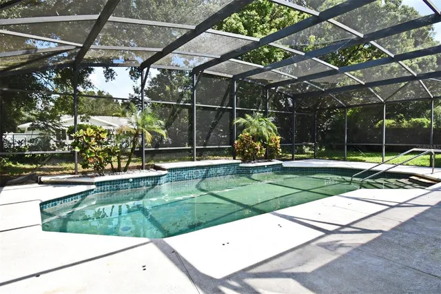 a room with gym equipment and windows