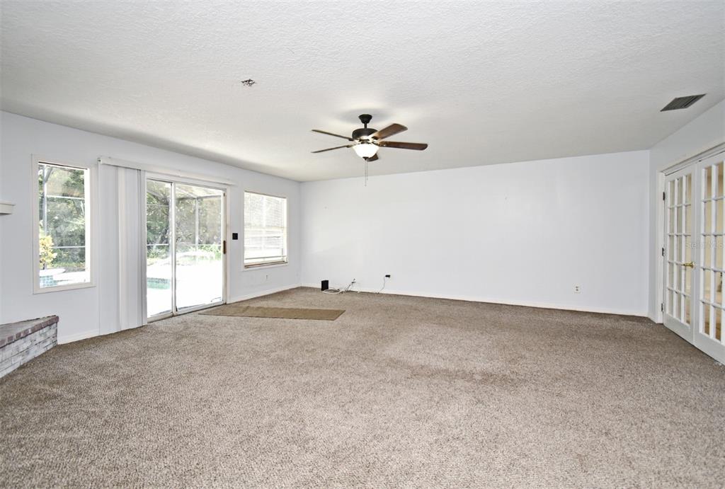 5133 Brenda Drive Orlando, FL 32812 - Photo 8 of 51 a view of an empty room with a window